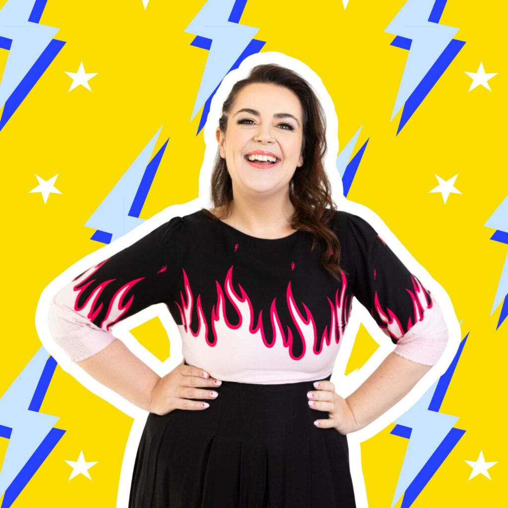 Rosie Parsons smiling in black flame dress with hands on her hips showcasing her business tips for female entrepreneurs category